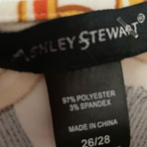 Jumpsuit, gold and black with white background,